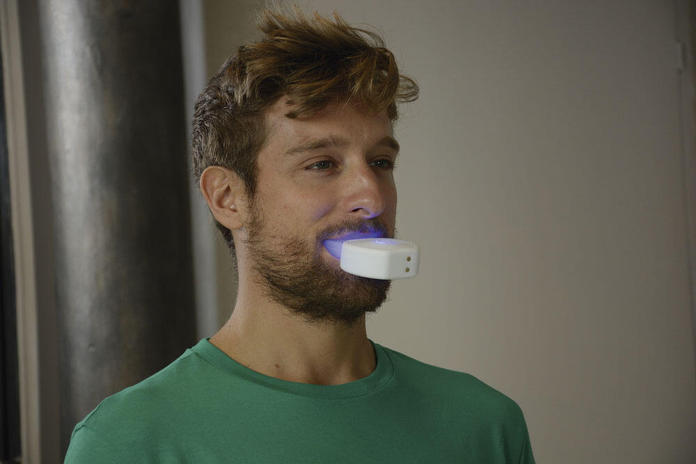 Cepillo dental eléctrico en forma de U